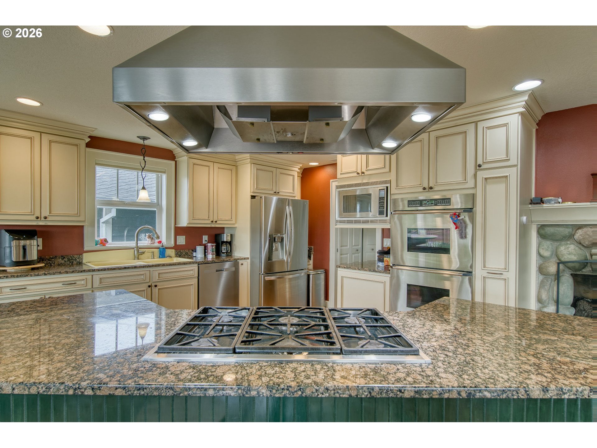 35432 Spence Street St. Helens, OR 97051 - Photo 7 of 48 a kitchen with stainless steel appliances granite countertop a sink stove and refrigerator