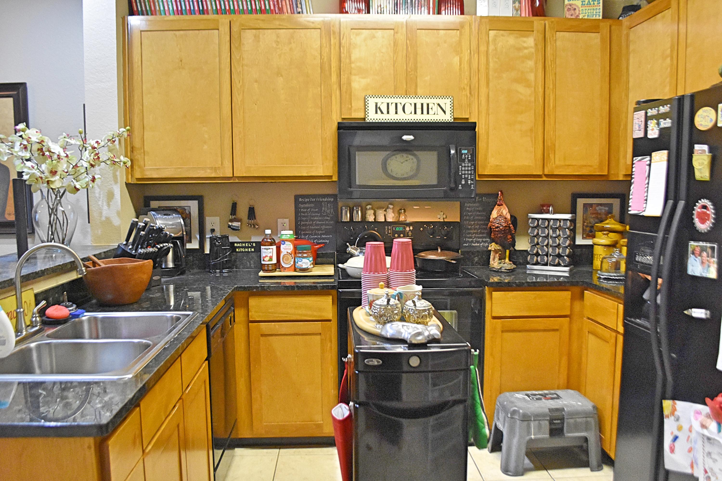 18 North Sand Palm Road, Unit 17 Freeport, FL 32439 - Photo 2 of 13 a kitchen with a sink and a stove next to a window