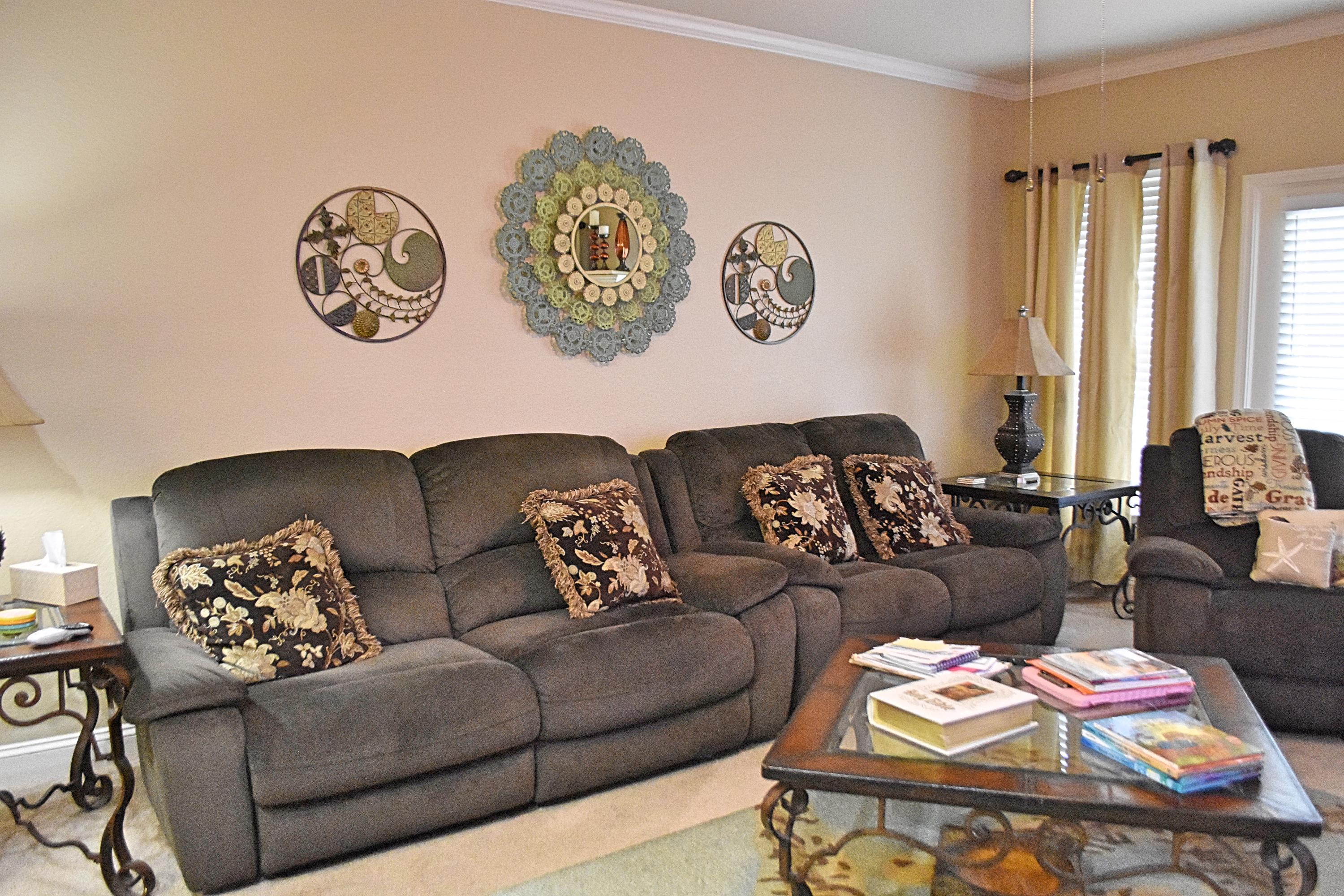 18 North Sand Palm Road, Unit 17 Freeport, FL 32439 - Photo 3 of 13 a living room with furniture and a table