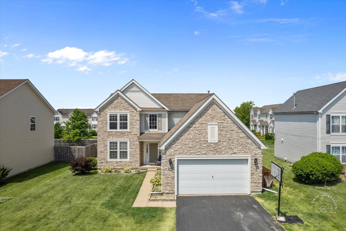 511 Silver Falls Street Joliet, IL 60431 - Photo 2 of 35 a view of house with garden