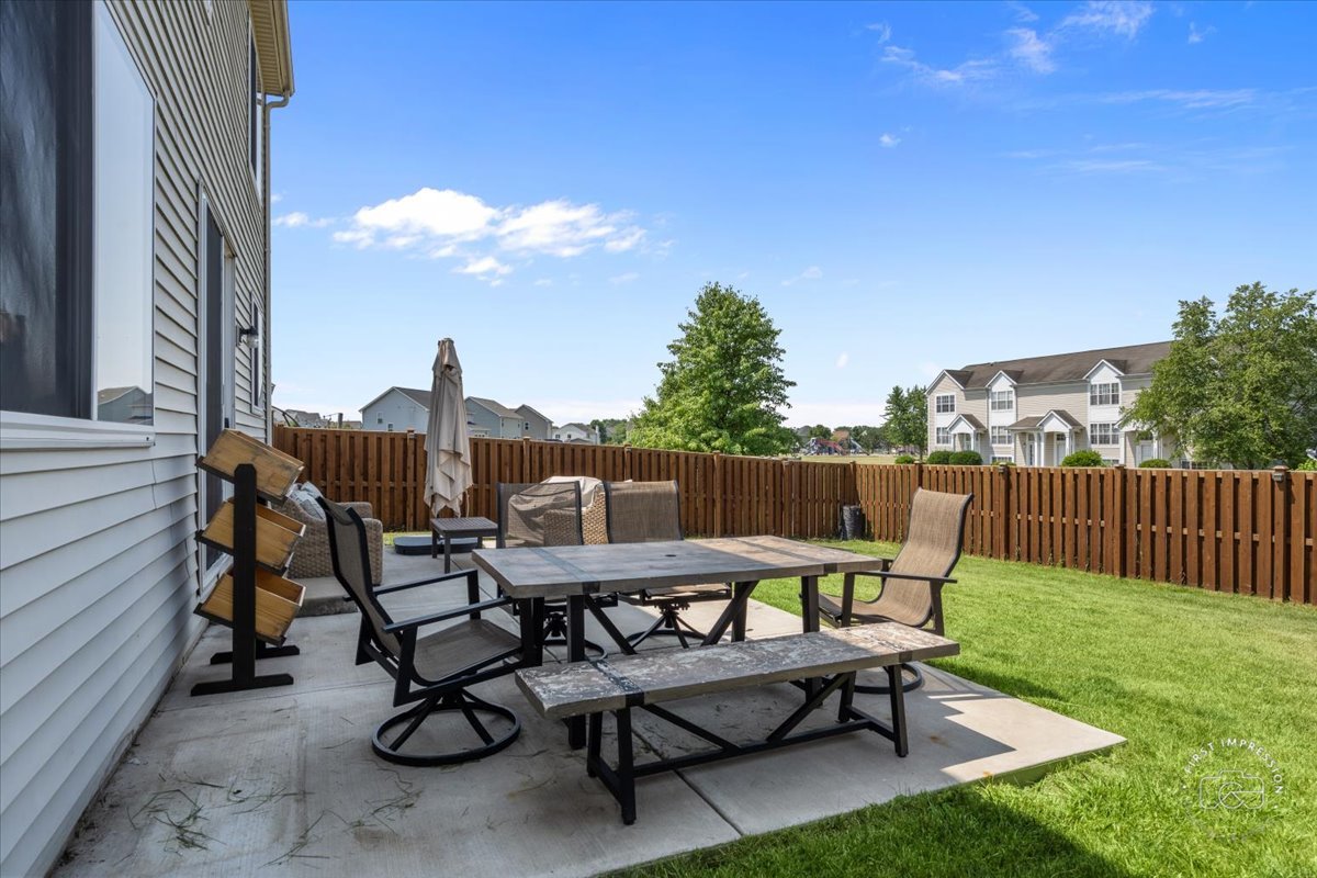 511 Silver Falls Street Joliet, IL 60431 - Photo 27 of 35 a view of backyard with furniture and outdoor seating
