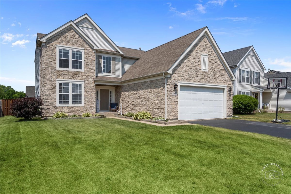 511 Silver Falls Street Joliet, IL 60431 - Photo 28 of 35 front view of a house and a yard