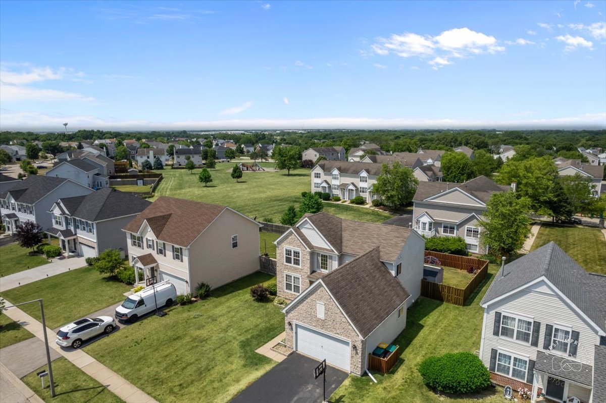 511 Silver Falls Street Joliet, IL 60431 - Photo 32 of 35 an aerial view of a house with a garden