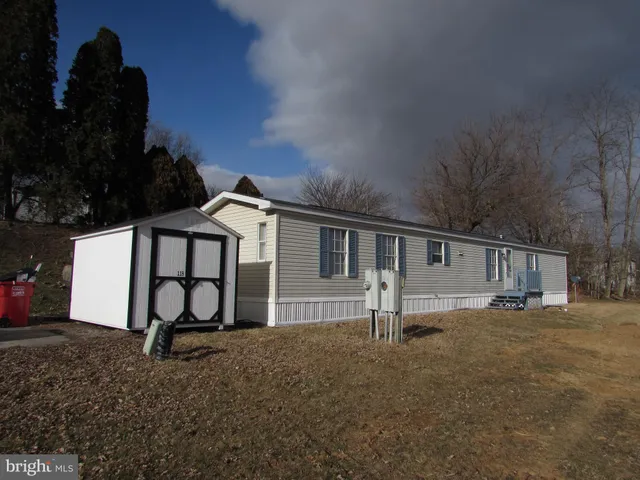 a house view with a backyard space