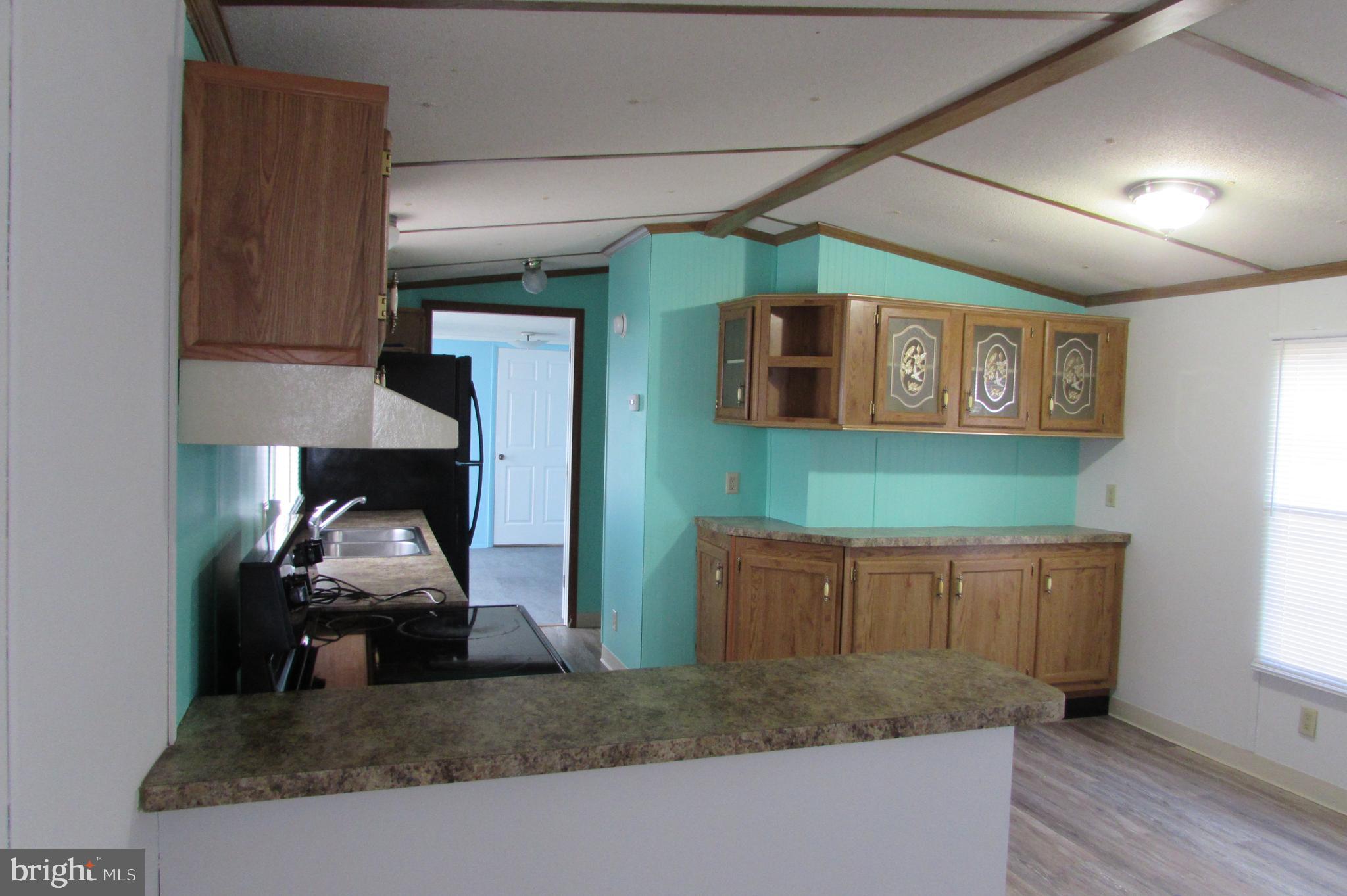 12222 Polktown Road Waynesboro, PA 17268 - Photo 3 of 22 a room with cabinets and furniture