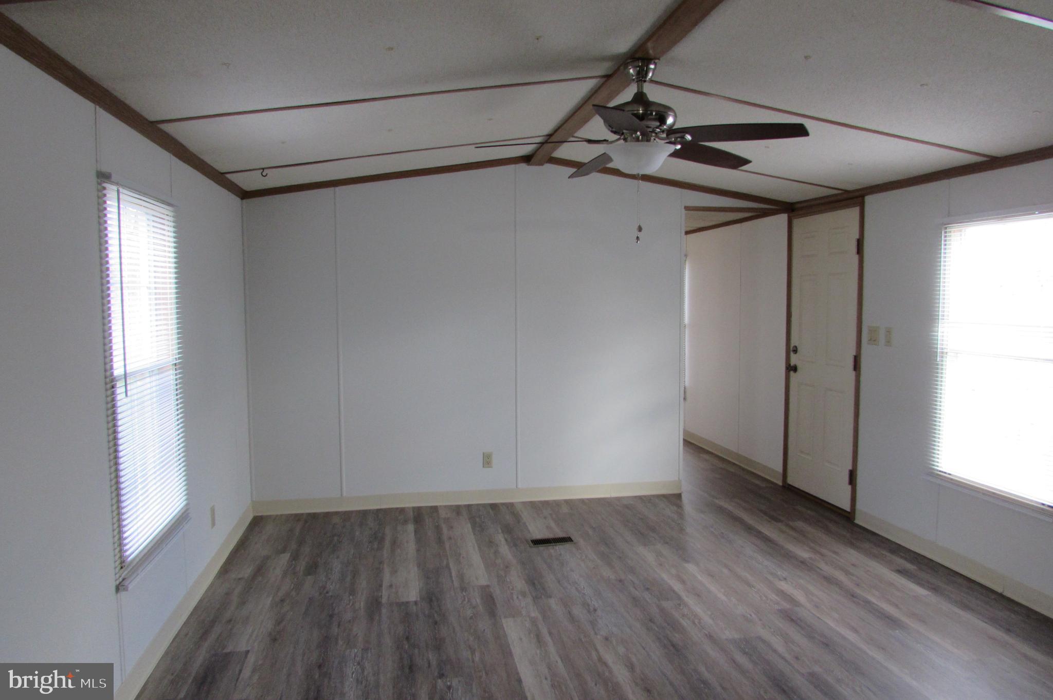 12222 Polktown Road Waynesboro, PA 17268 - Photo 5 of 22 a view of a room with wooden floors and windows