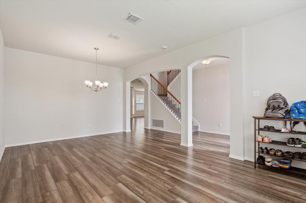 3220 Marston Road Lorena, TX 76655 - Photo 7 of 40 a view of a livingroom with wooden floor