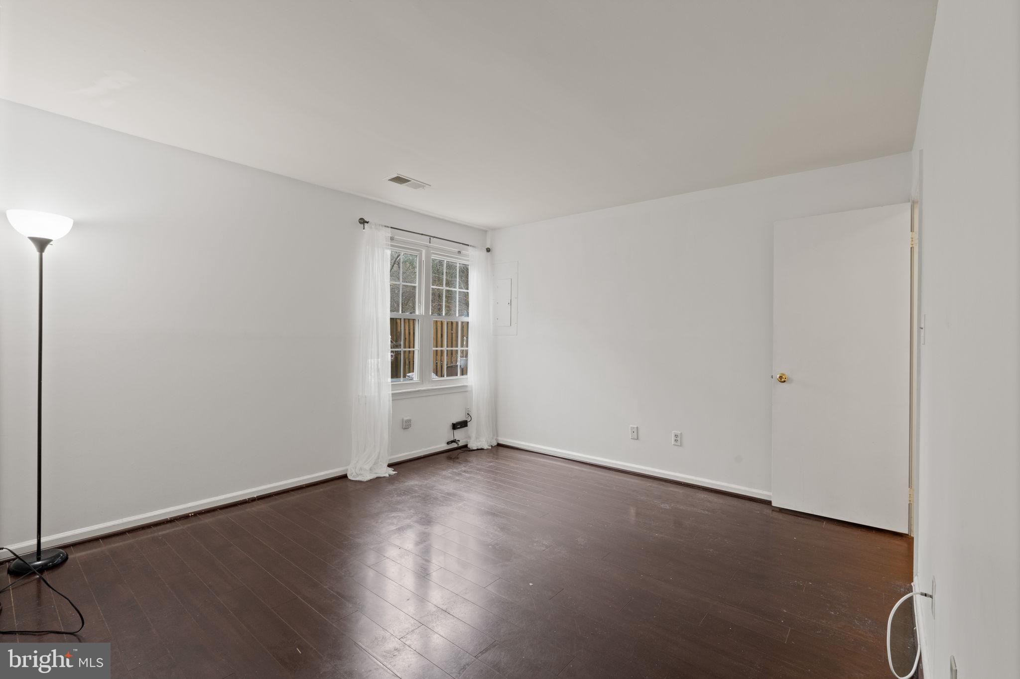 4209 Stockbridge Drive Dumfries, VA 22025 - Photo 15 of 26 an empty room with wooden floor