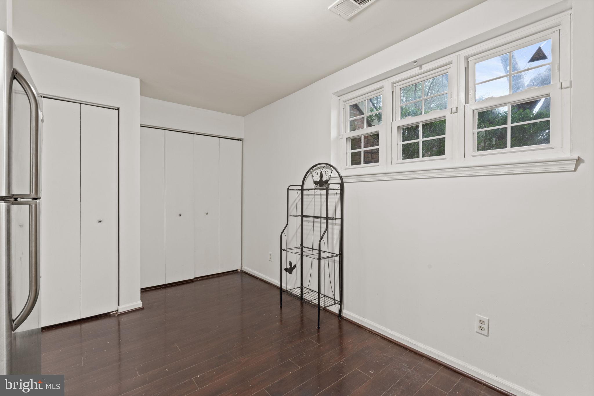 4209 Stockbridge Drive Dumfries, VA 22025 - Photo 21 of 26 a view of empty room with wooden floor and fan