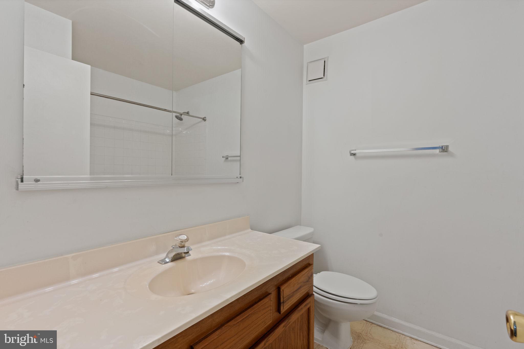 4209 Stockbridge Drive Dumfries, VA 22025 - Photo 9 of 26 a bathroom with a sink and a toilet