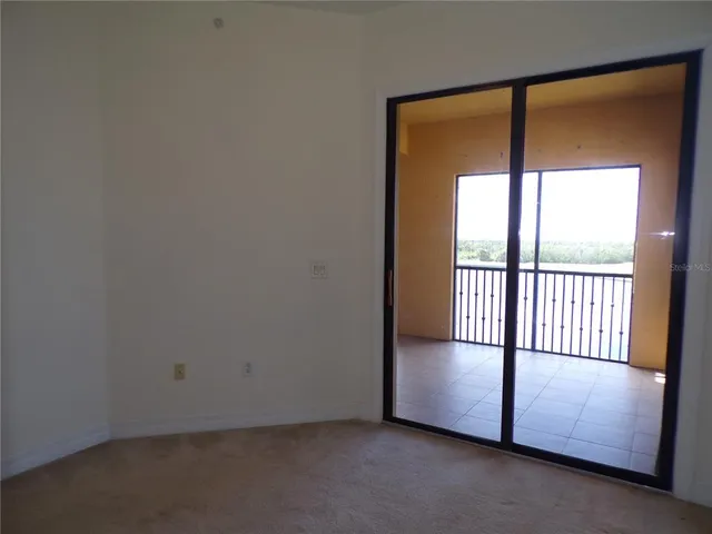 an empty room with sliding door