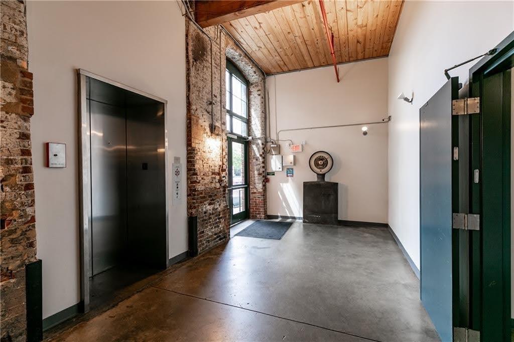 170 Boulevard Southeast, Unit 131H Atlanta, GA 30312 - Photo 5 of 47 a view of an entryway with a hallway