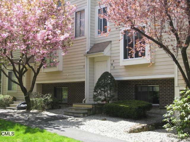 71 Aiken Street, Unit R4 Norwalk, CT 06851 - Photo 1 of 1 a front view of a house with garden