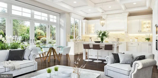 a living room with furniture and floor to ceiling windows