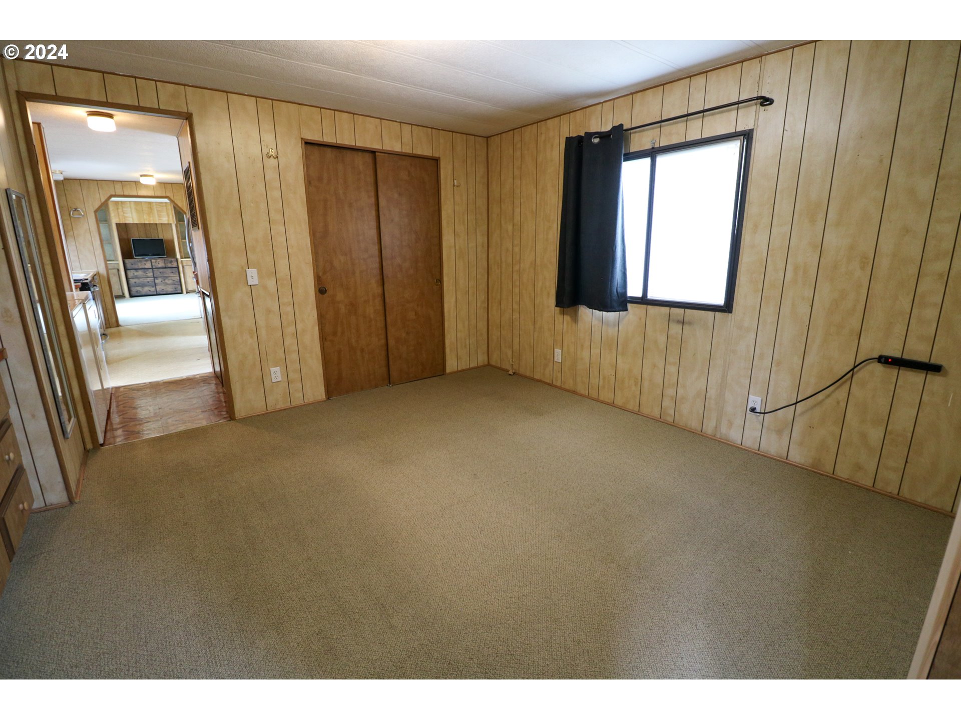 1265 Embarcadero Circle Coos Bay, OR 97420 - Photo 17 of 36 a view of an empty room and a window