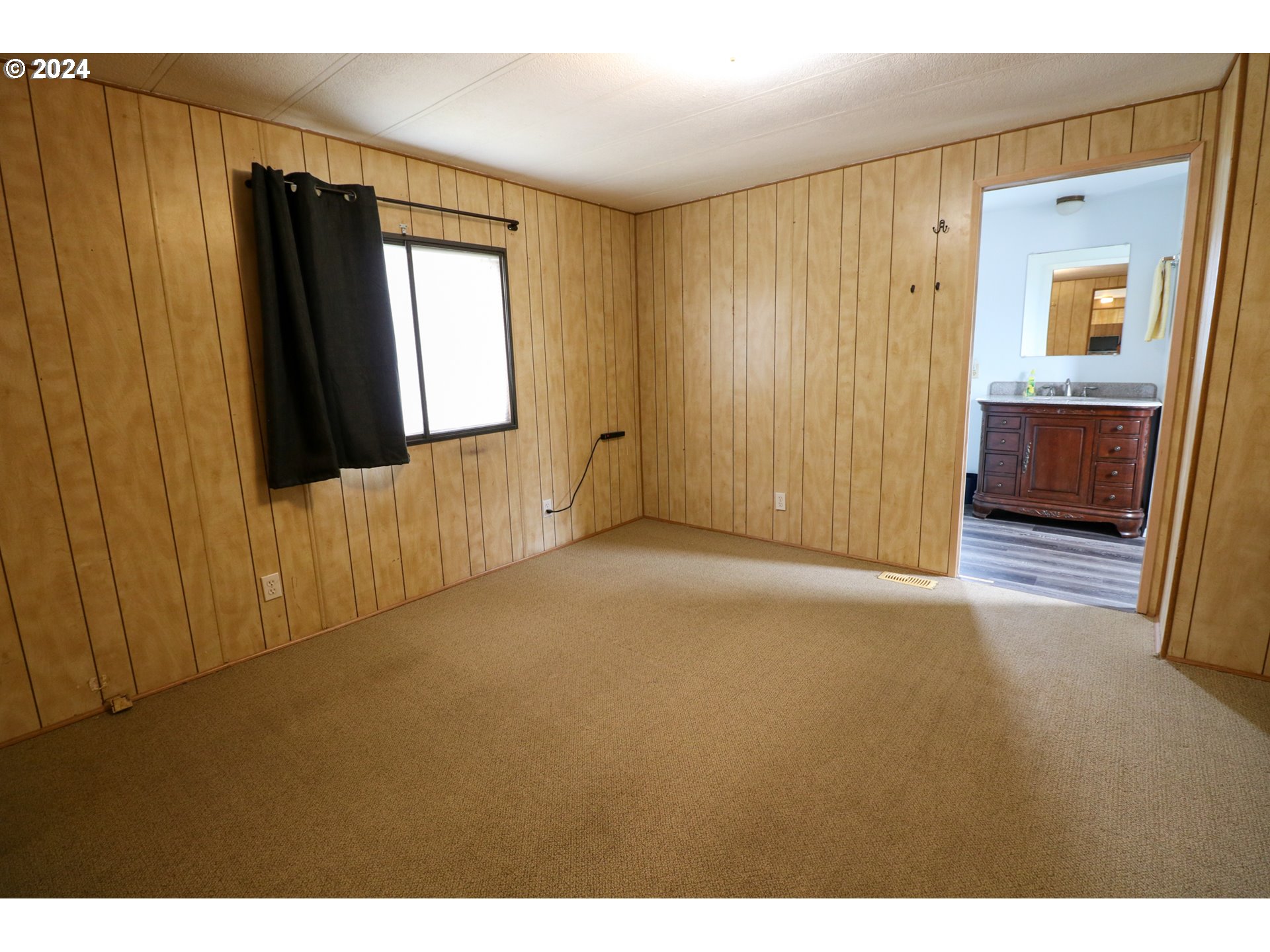 1265 Embarcadero Circle Coos Bay, OR 97420 - Photo 18 of 36 a view of an empty room with a window