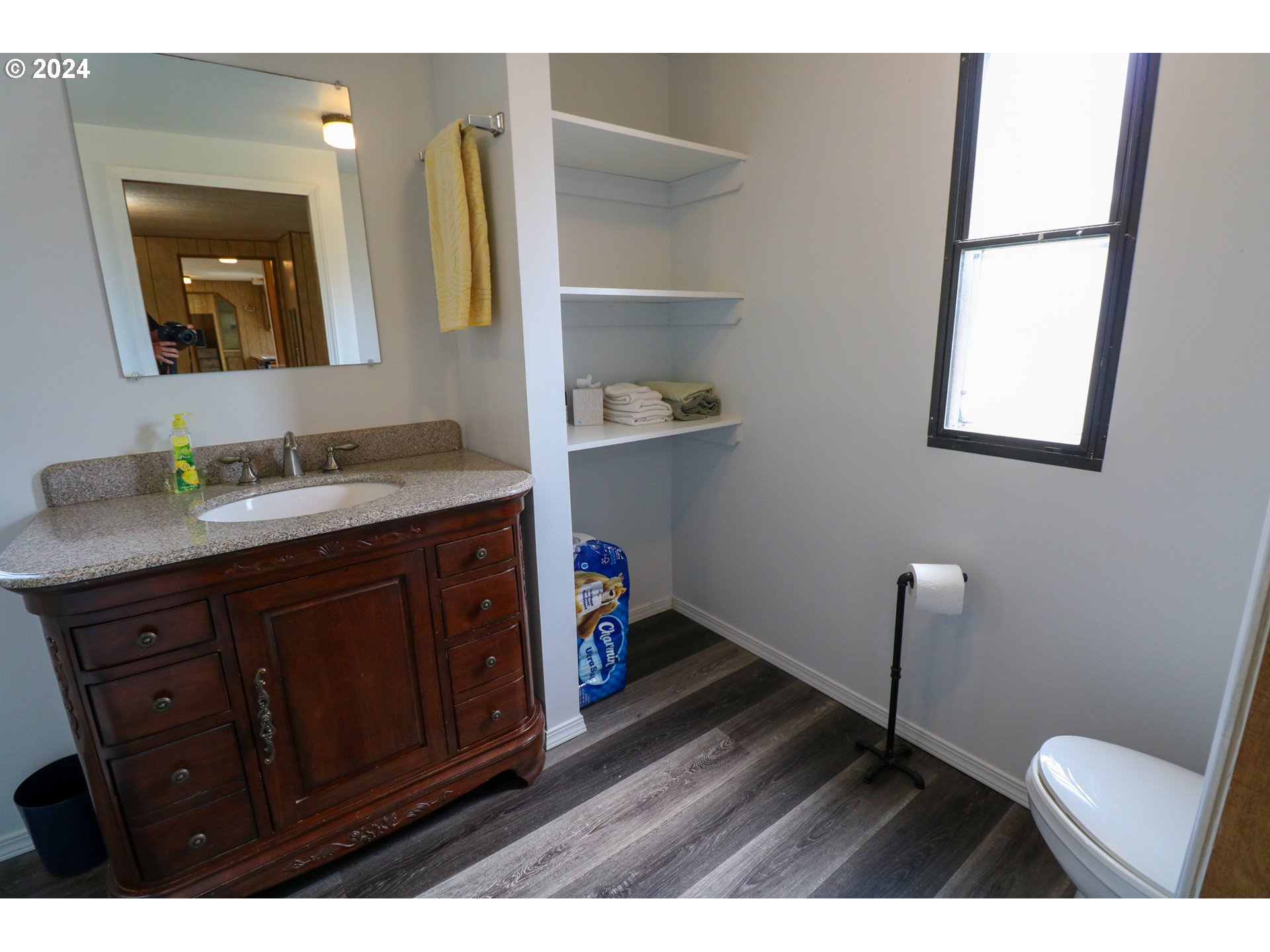 1265 Embarcadero Circle Coos Bay, OR 97420 - Photo 19 of 36 a bathroom with a sink and a mirror