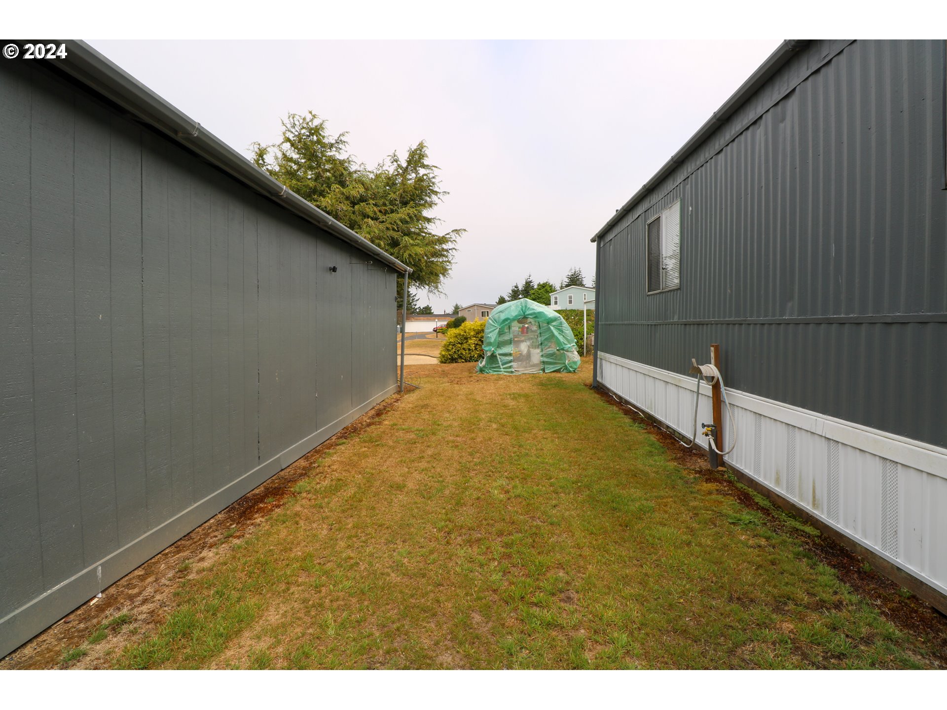 1265 Embarcadero Circle Coos Bay, OR 97420 - Photo 27 of 36 a view of a backyard