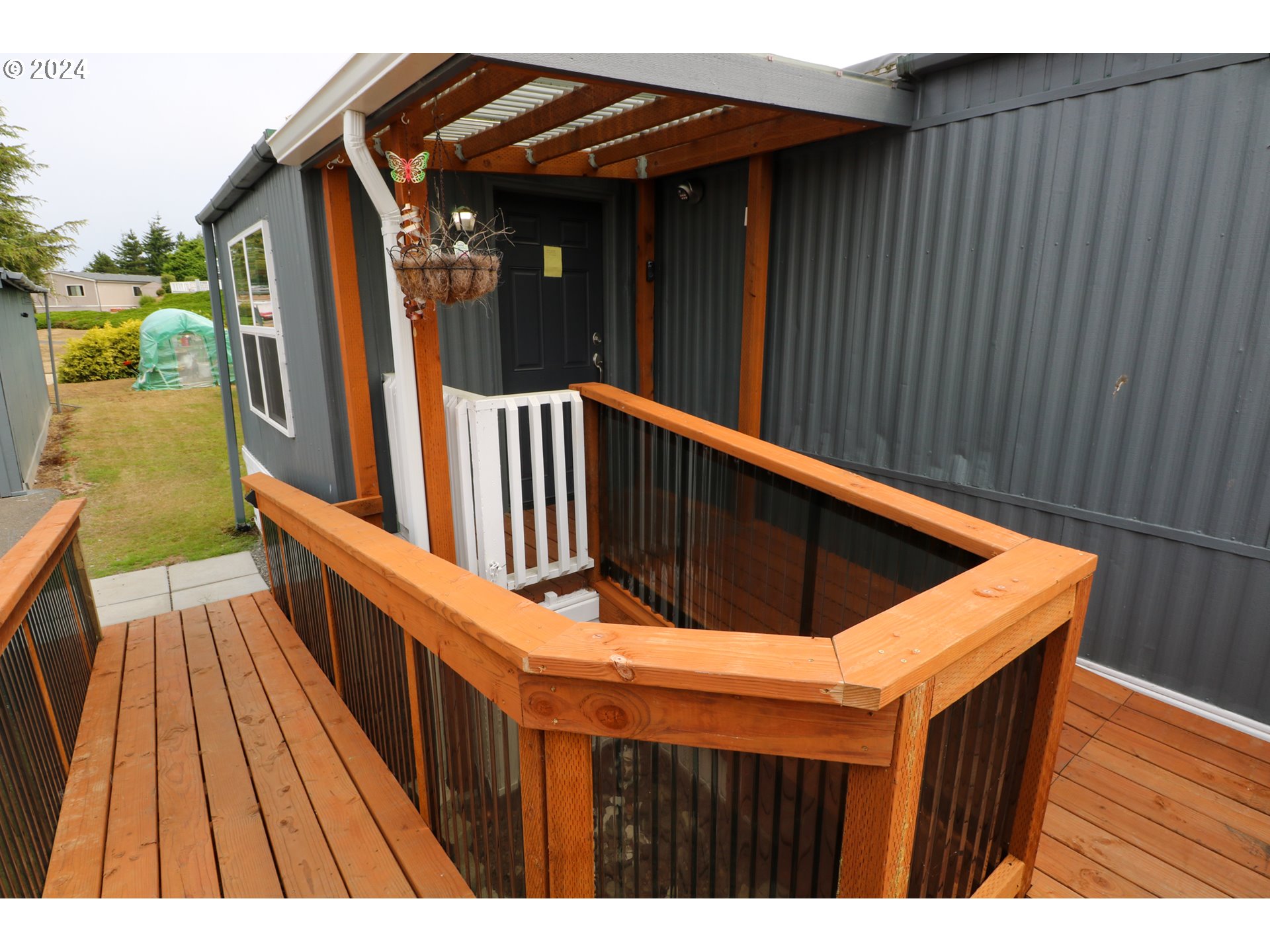 1265 Embarcadero Circle Coos Bay, OR 97420 - Photo 4 of 36 a view of balcony with wooden floor