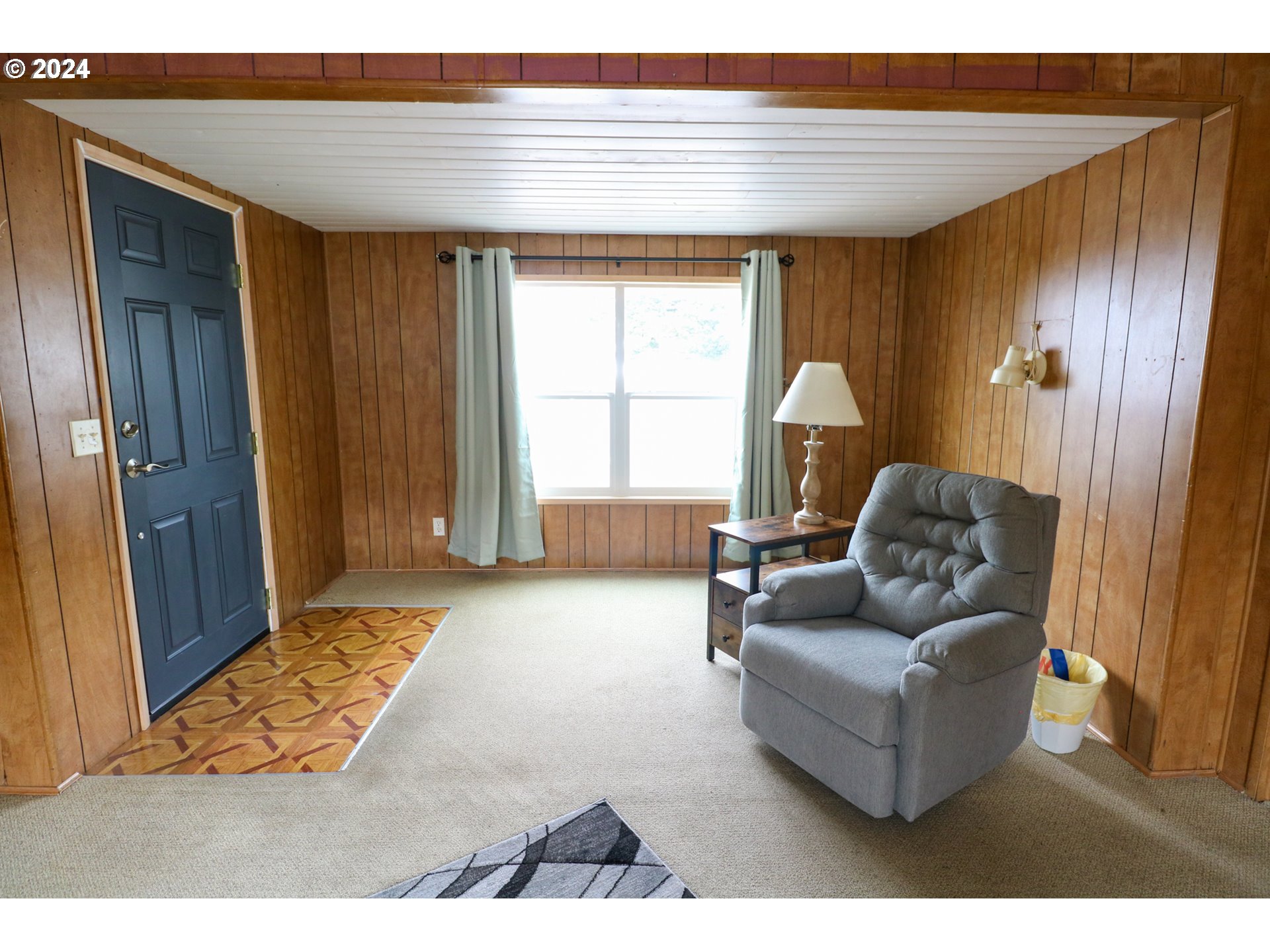 1265 Embarcadero Circle Coos Bay, OR 97420 - Photo 5 of 36 a living room with furniture and a window