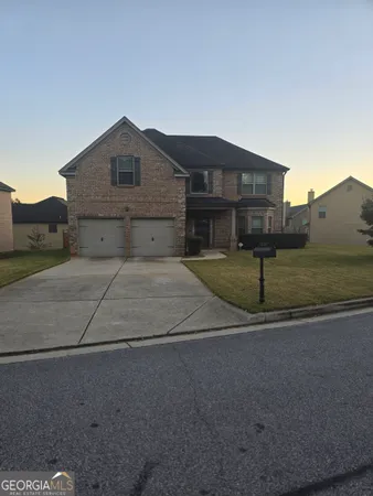 a house view with a outdoor space