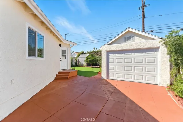 a view of backyard with a small cabin