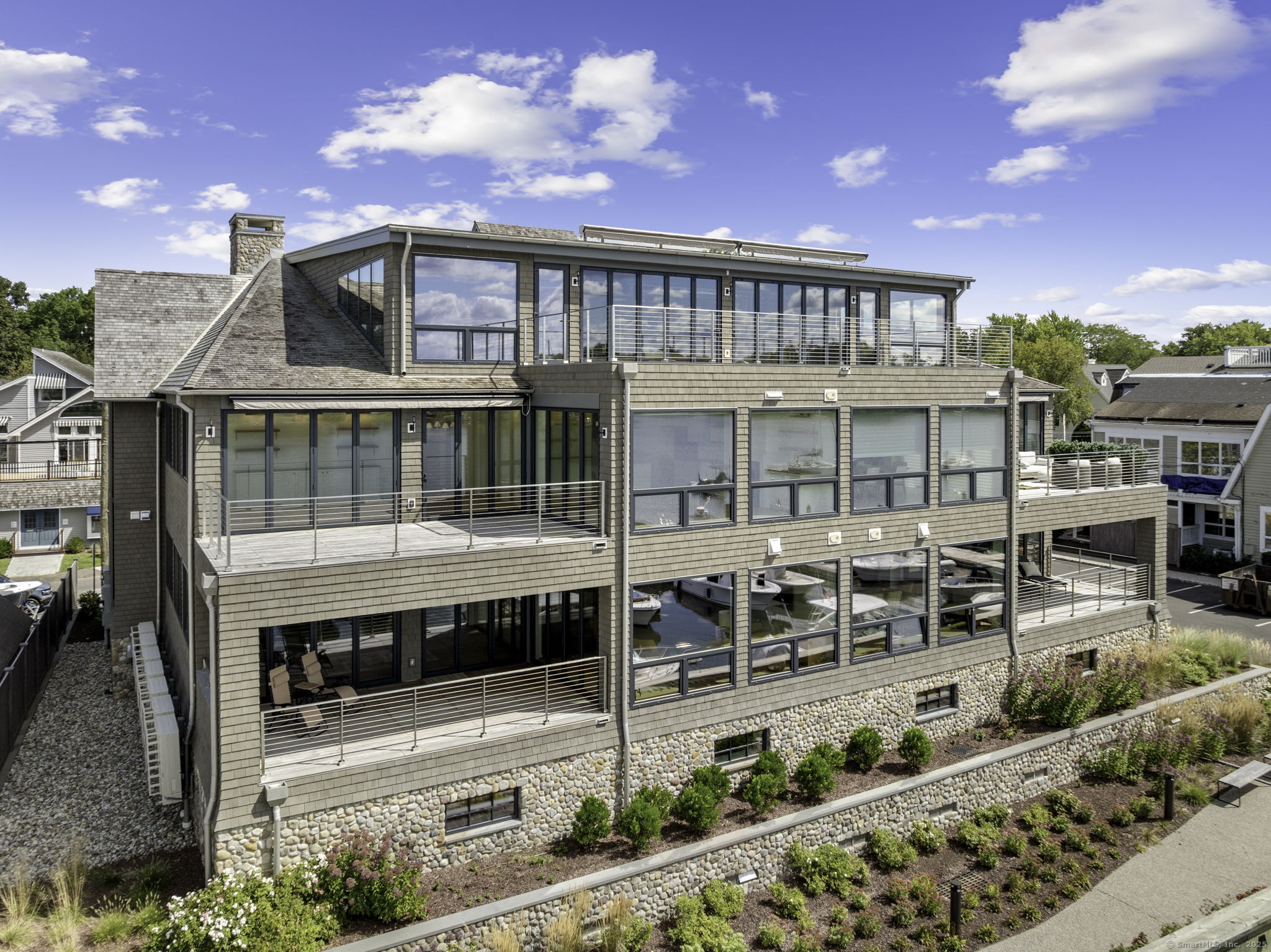 a view of a house with backyard porch and sitting area