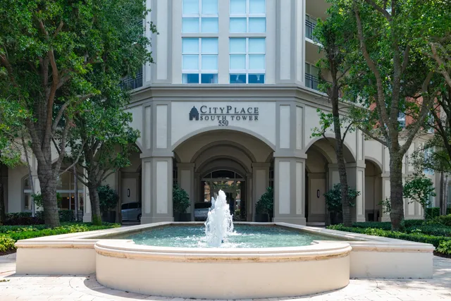 a view of building with tree s