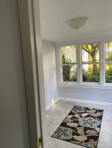 a window in a room next to a window