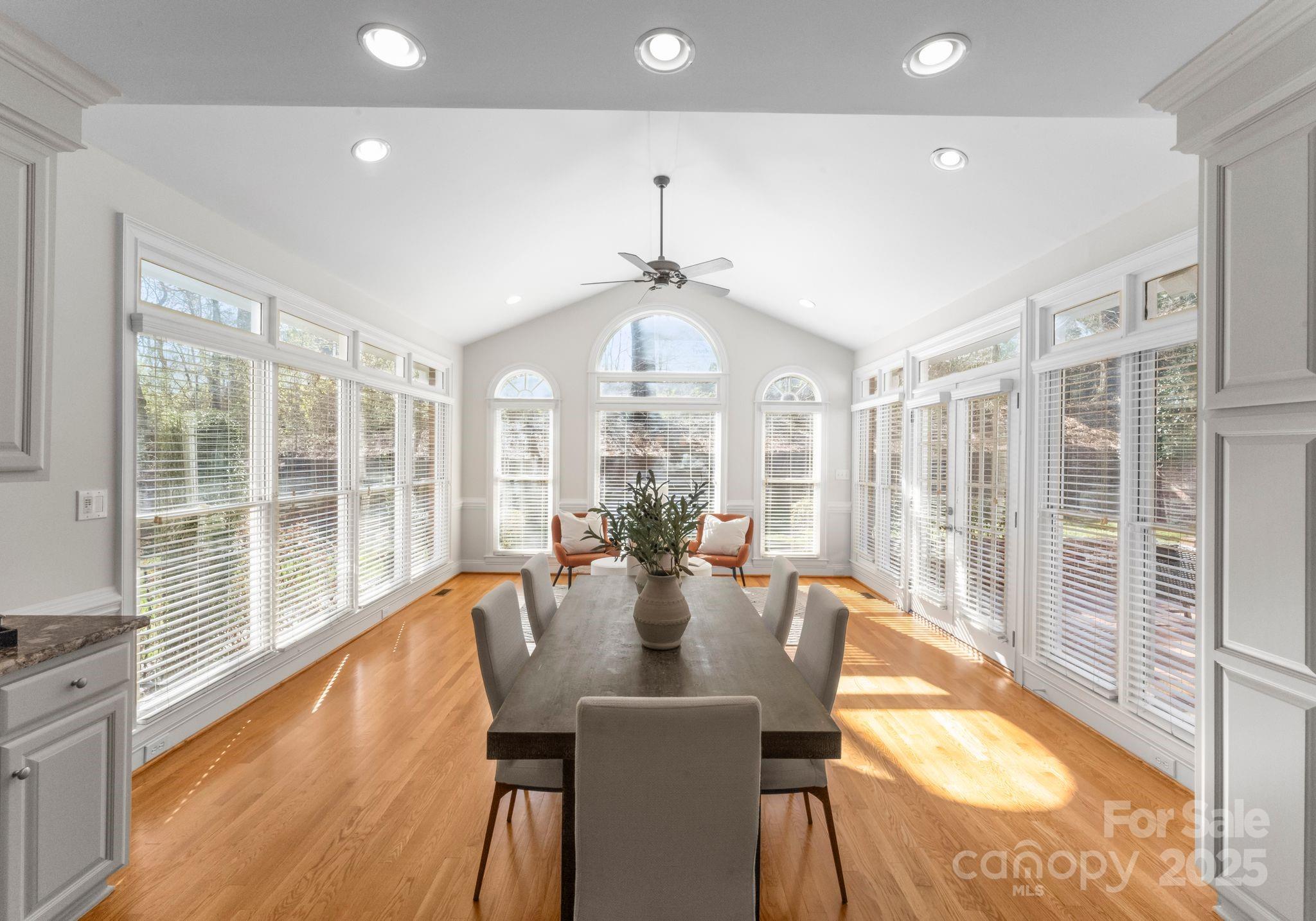 1604 Windy Ridge Road Charlotte, NC 28270 - Photo 13 of 39 a view of a dining room with furniture window and wooden floor