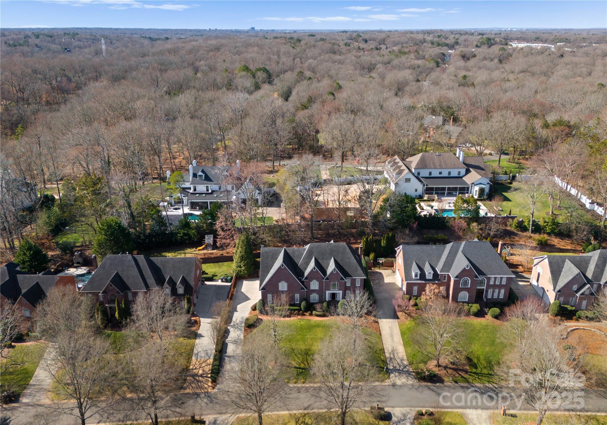 1604 Windy Ridge Road Charlotte, NC 28270 - Photo 3 of 39 an aerial view of multiple house