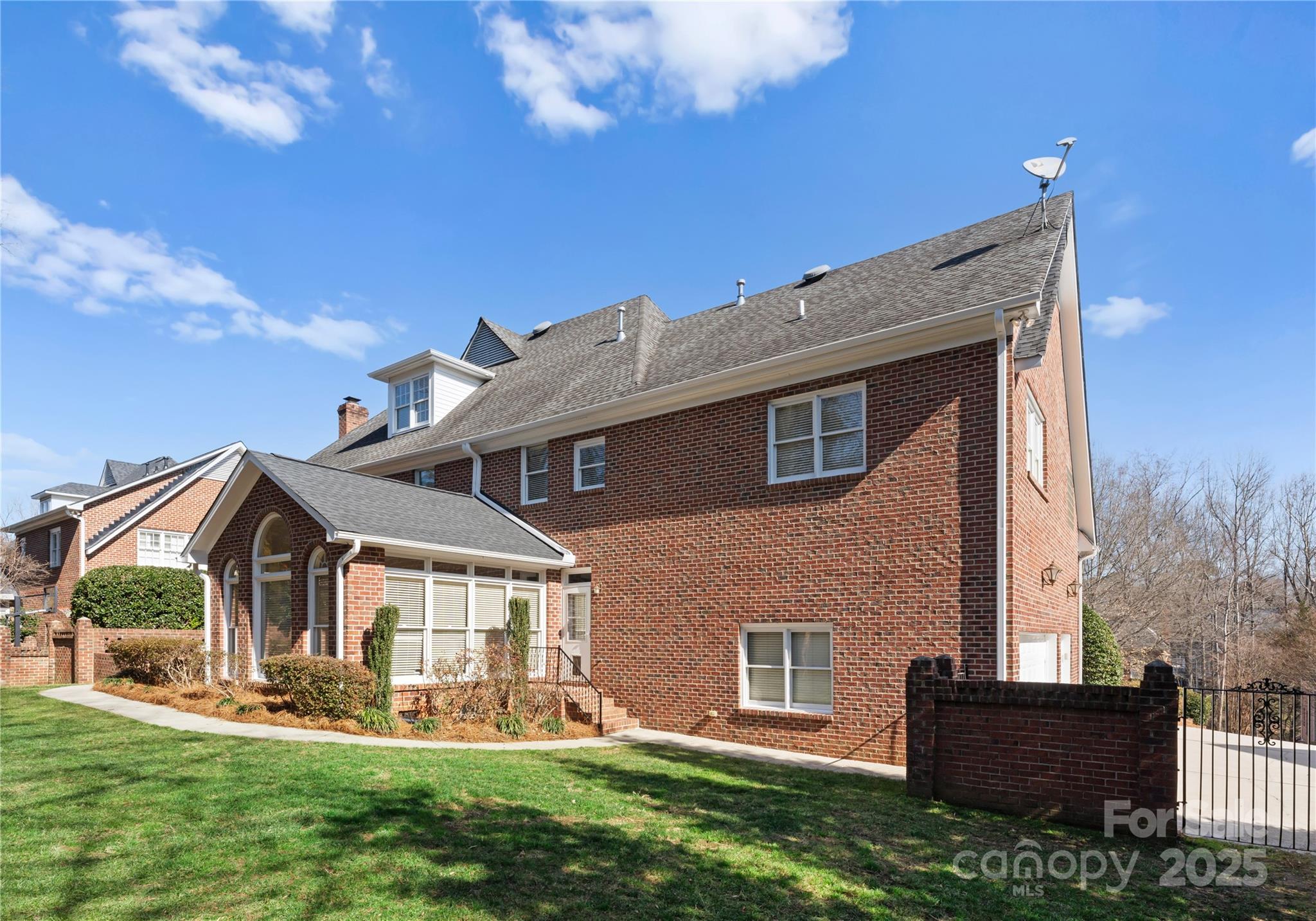 1604 Windy Ridge Road Charlotte, NC 28270 - Photo 34 of 39 a front view of a house with a yard