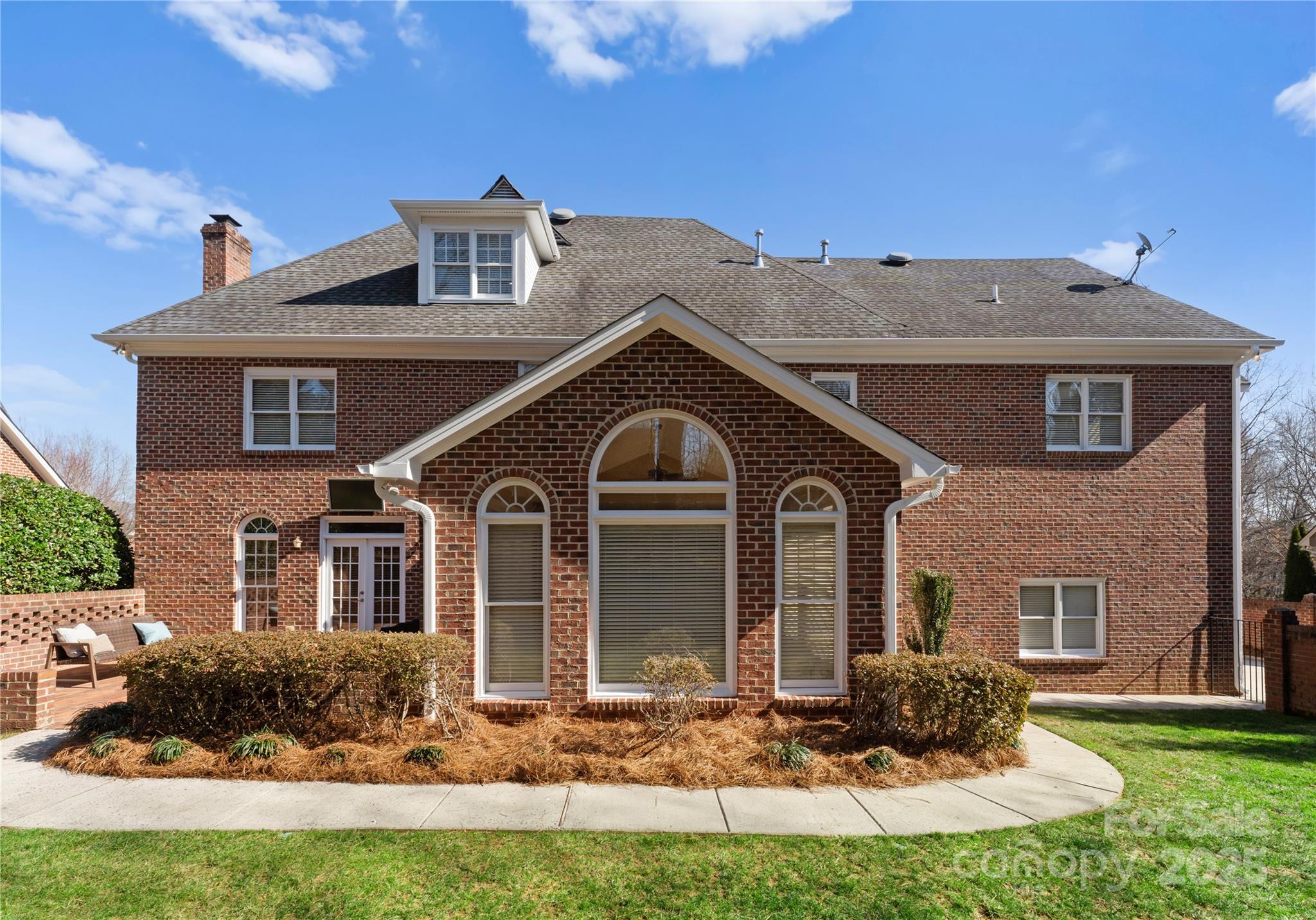 1604 Windy Ridge Road Charlotte, NC 28270 - Photo 36 of 39 a front view of a house with a yard