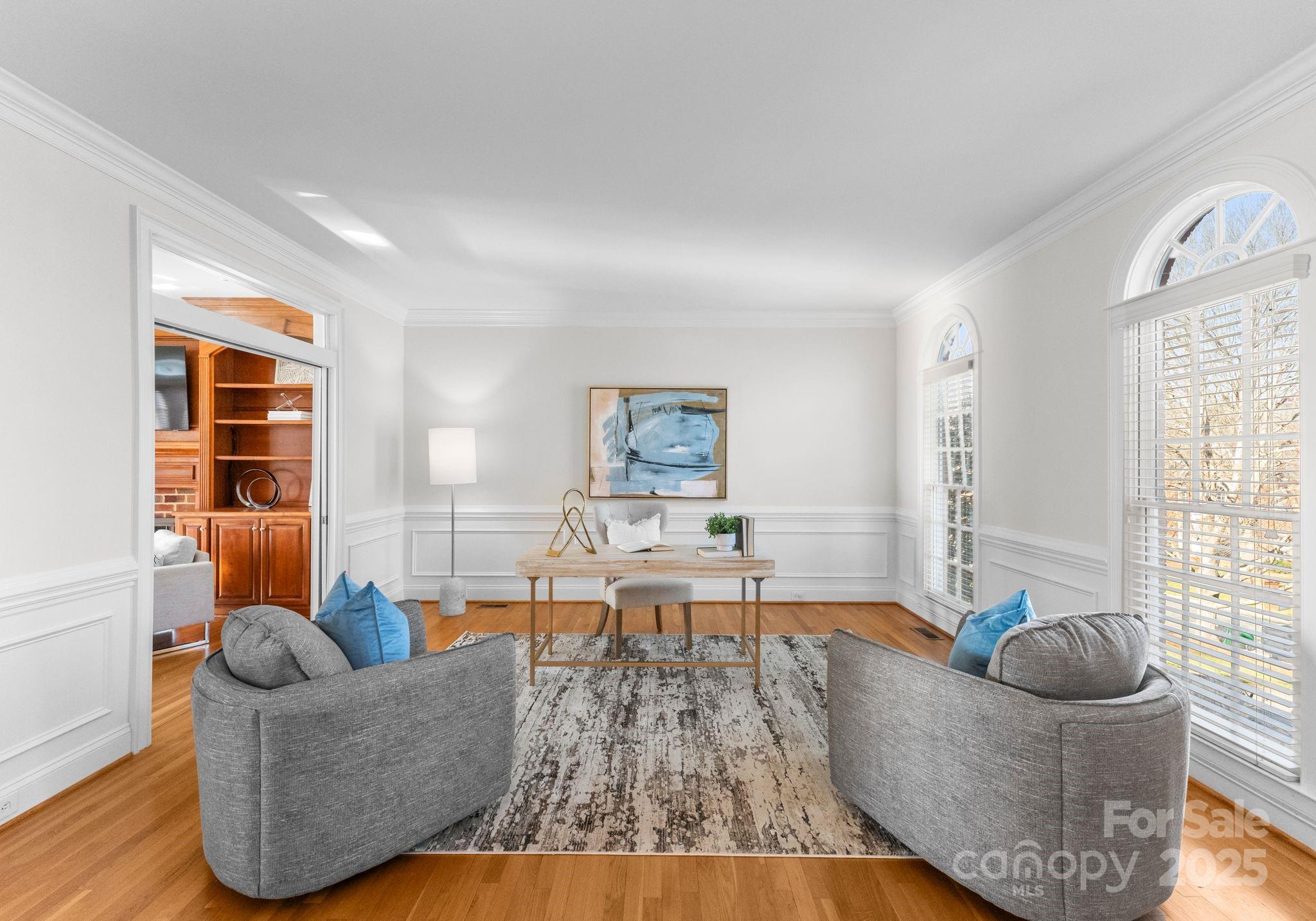 1604 Windy Ridge Road Charlotte, NC 28270 - Photo 6 of 39 a living room with furniture and a large window
