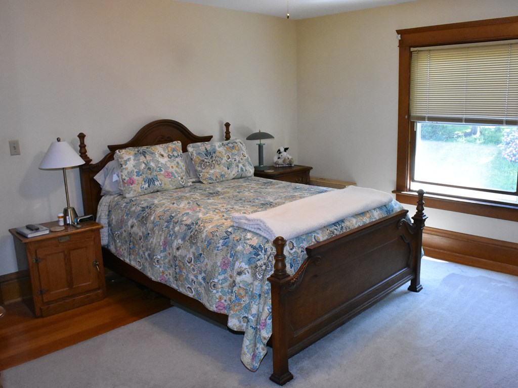 655 Chestnut Street Meadville, PA 16335 - Photo 23 of 43 a bedroom with a bed and a larger window