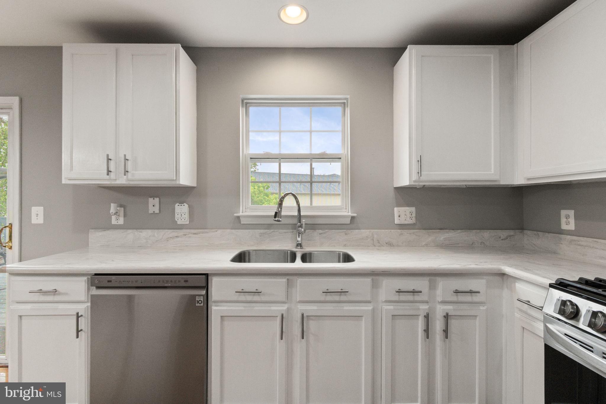 60 Ripley Road Stafford, VA 22556 - Photo 18 of 48 Granite counters complement the white cabinets