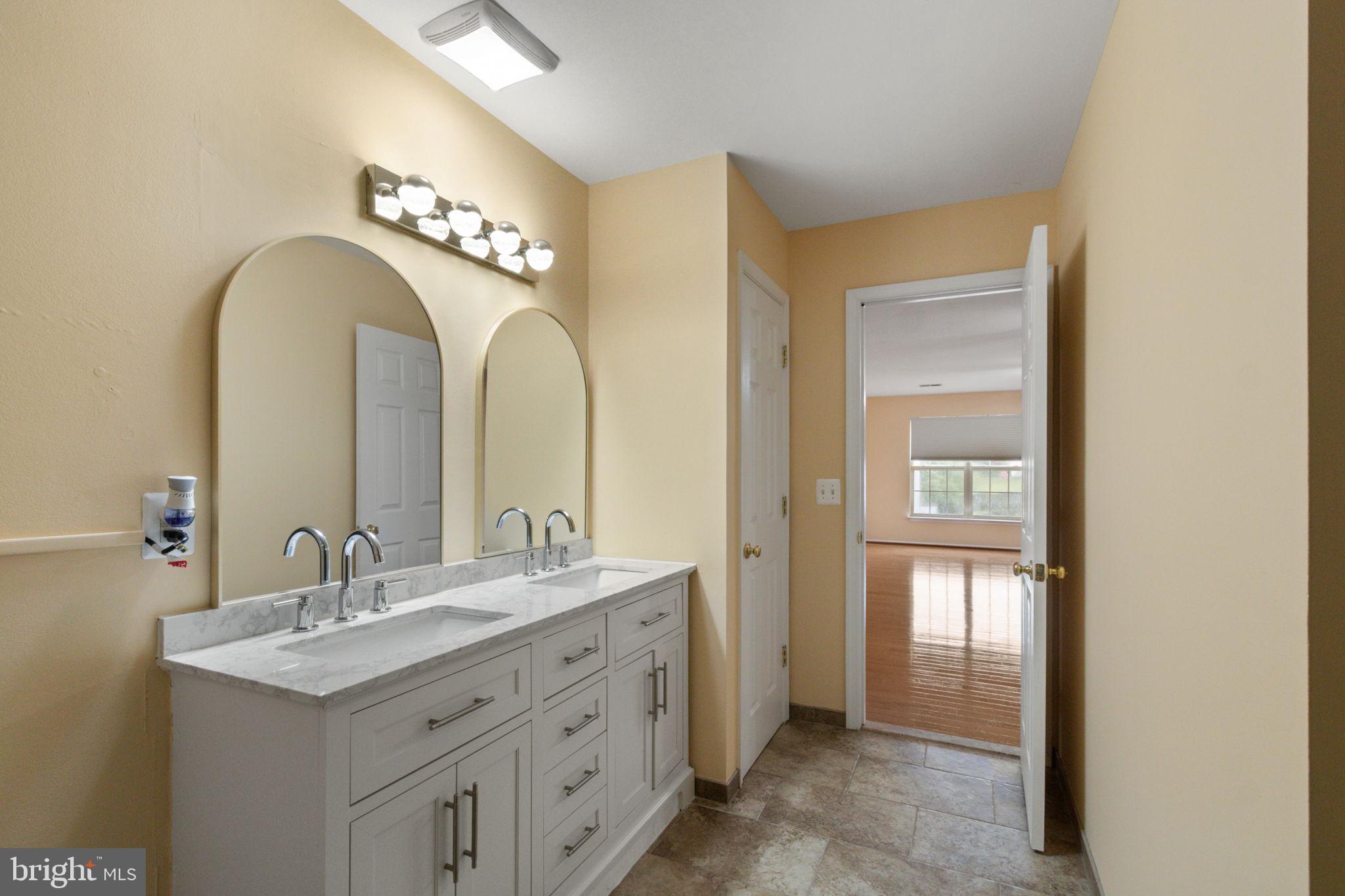 60 Ripley Road Stafford, VA 22556 - Photo 26 of 48 Primary en suite has quartz topped dual vanity