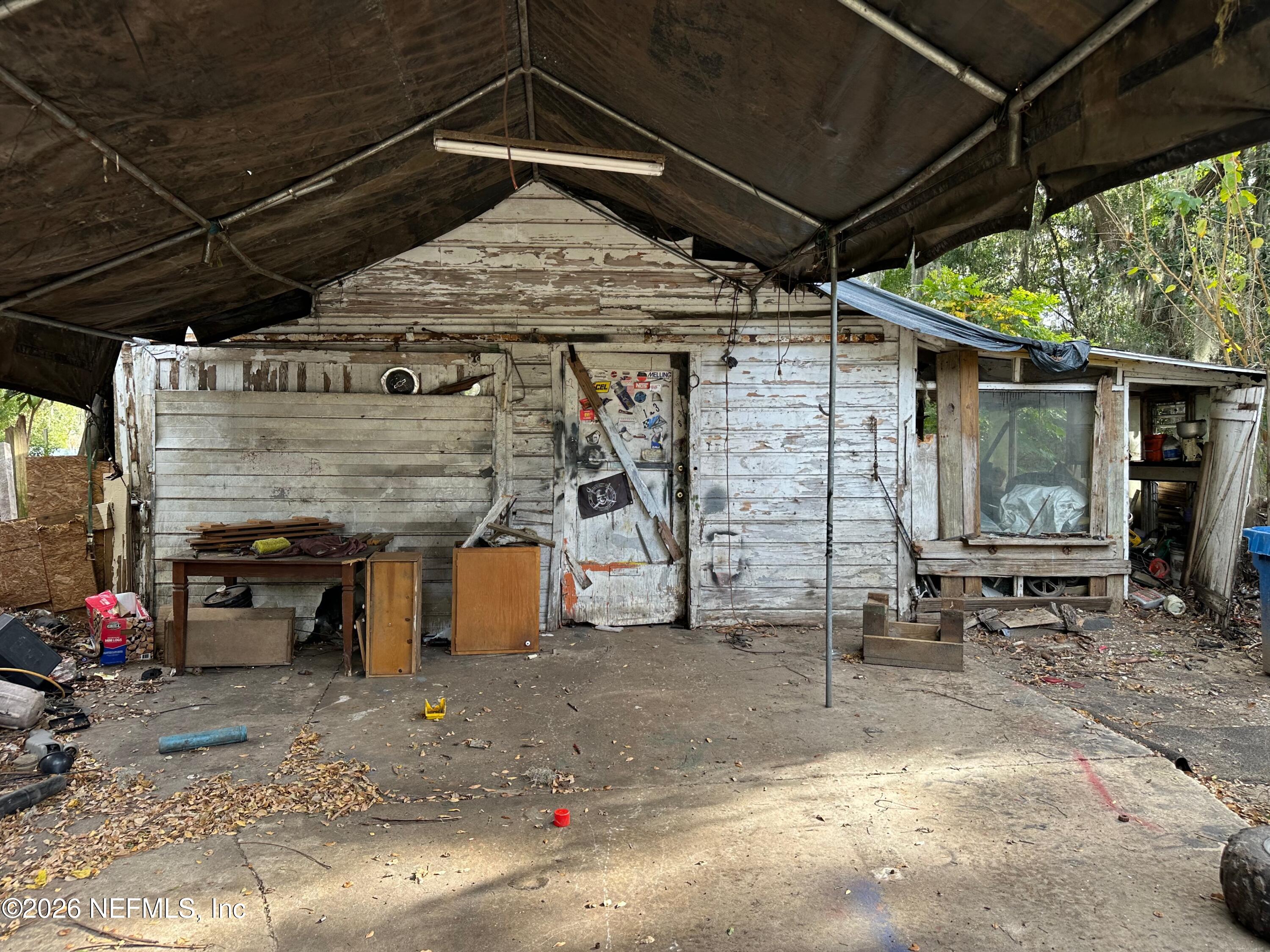 421 Arlington Road North Jacksonville, FL 32211 - Photo 15 of 25 a view of a garage with chairs