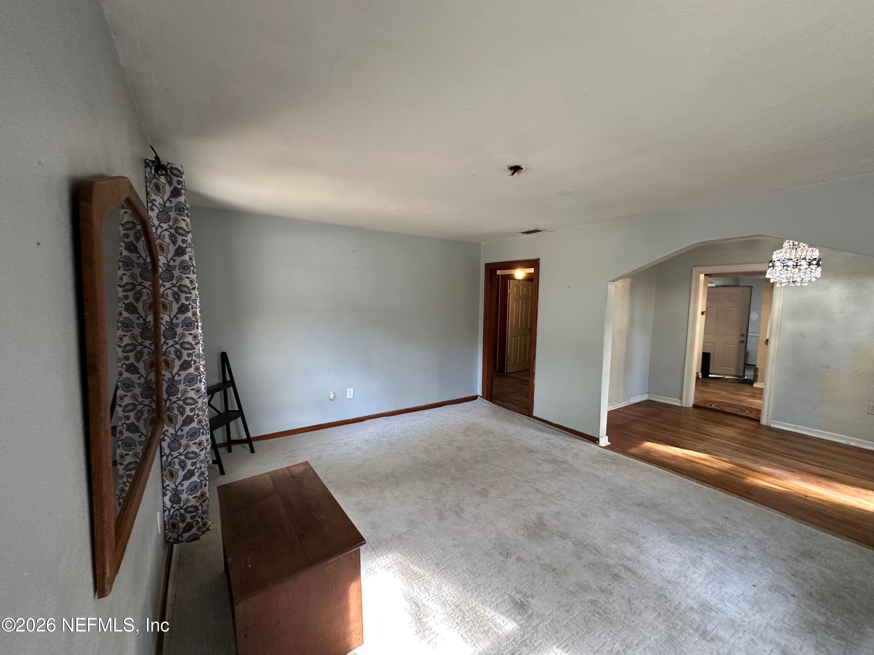 421 Arlington Road North Jacksonville, FL 32211 - Photo 17 of 25 a view of a livingroom with a staircase