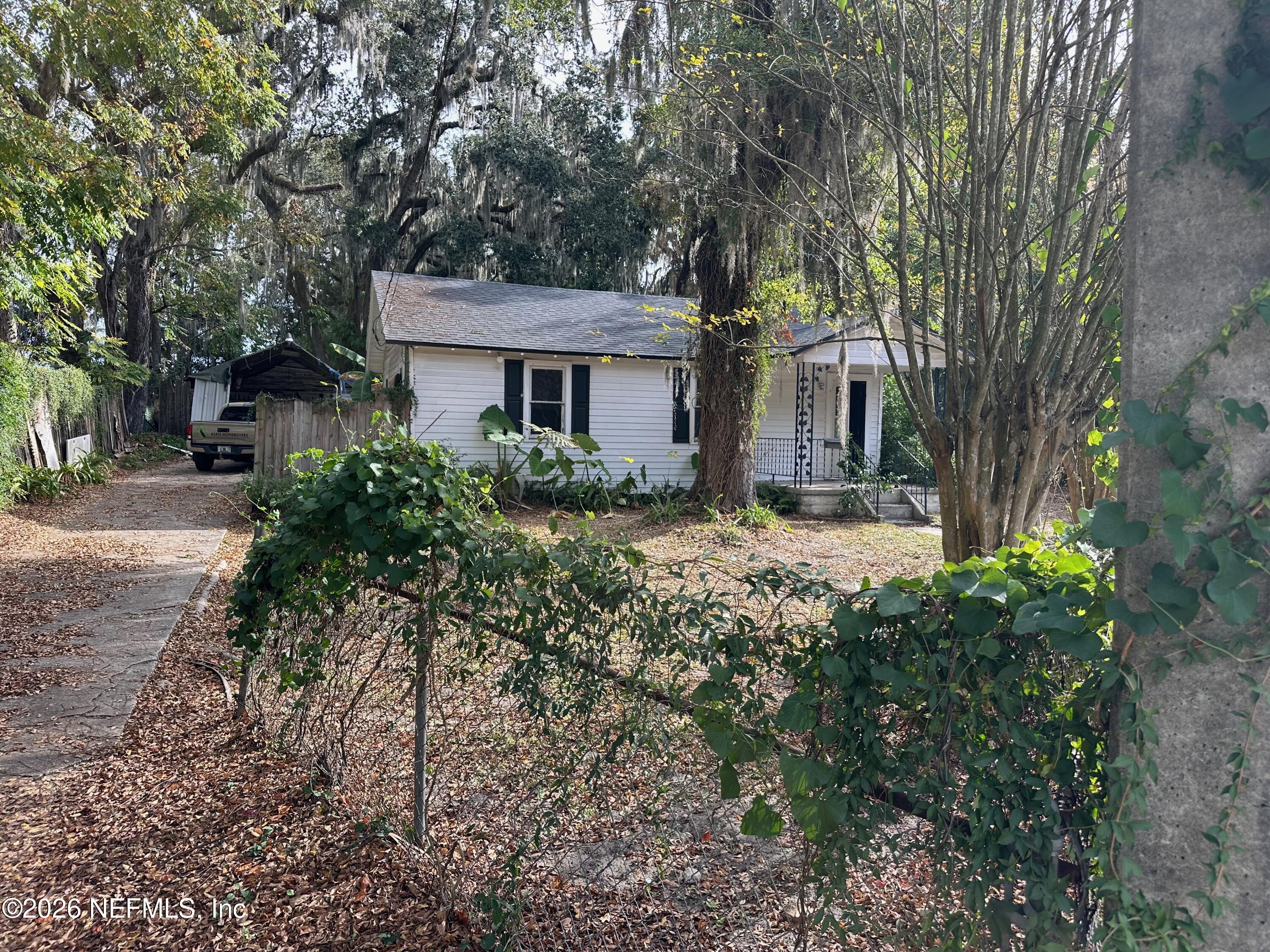 421 Arlington Road North Jacksonville, FL 32211 - Photo 2 of 25 a front view of a house with yard and green space