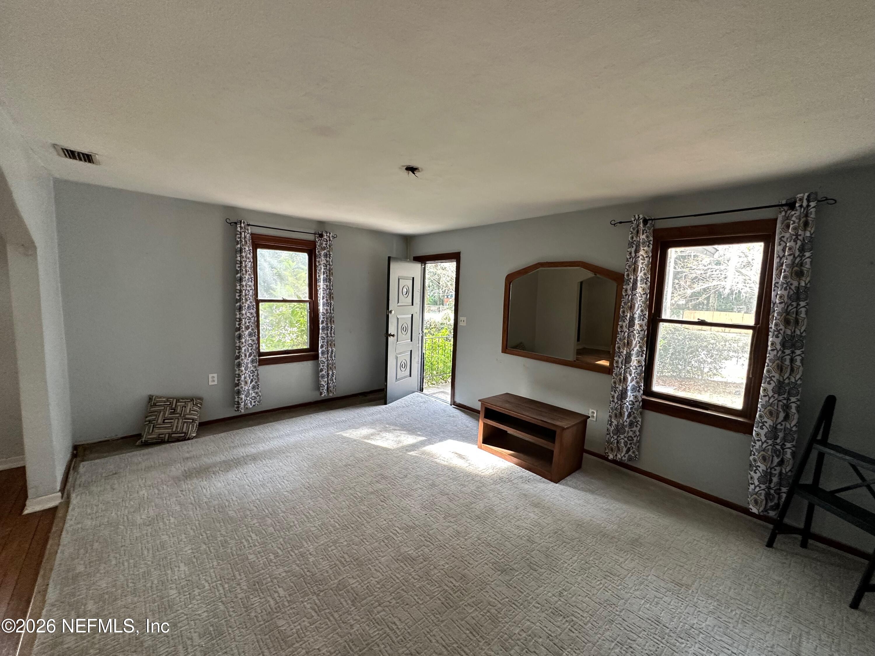 421 Arlington Road North Jacksonville, FL 32211 - Photo 24 of 25 a living room with furniture and a window