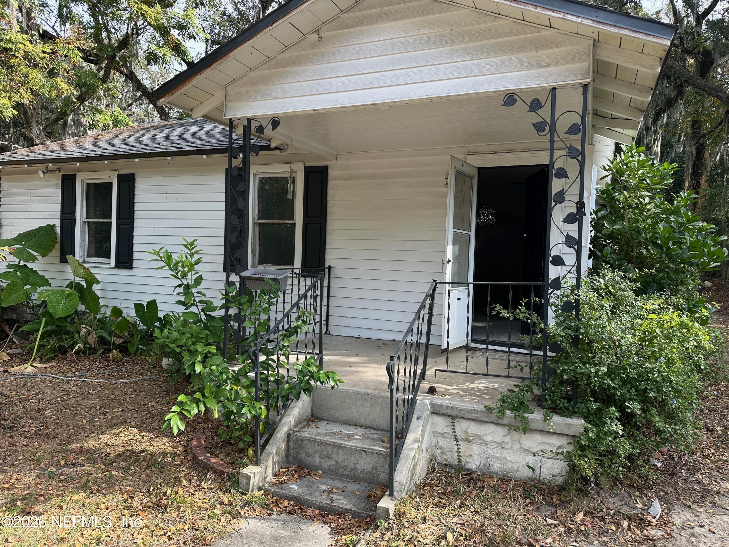 421 Arlington Road North Jacksonville, FL 32211 - Photo 5 of 25 a front view of a house with garden