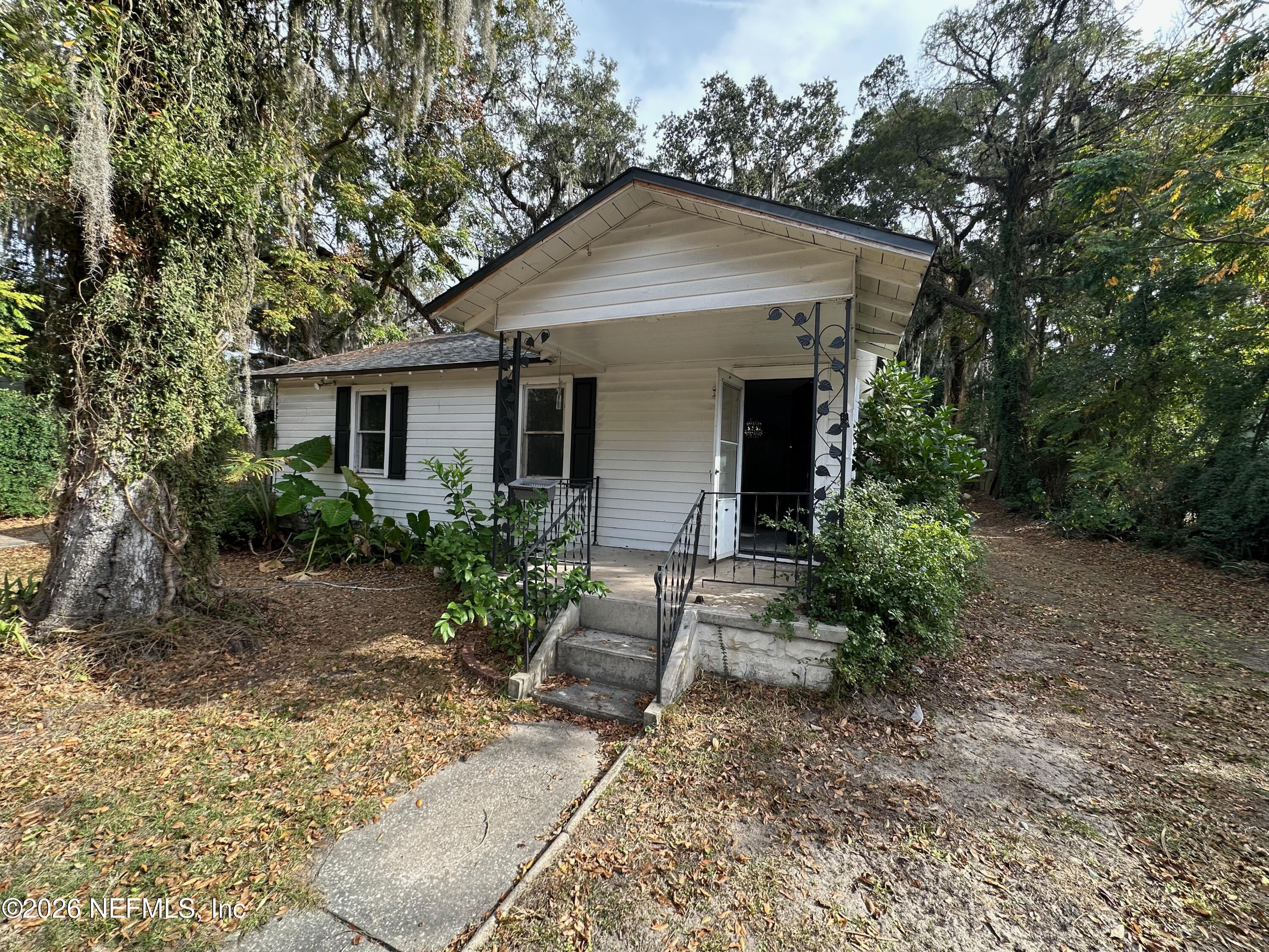 421 Arlington Road North Jacksonville, FL 32211 - Photo 6 of 25 a front view of a house with garden