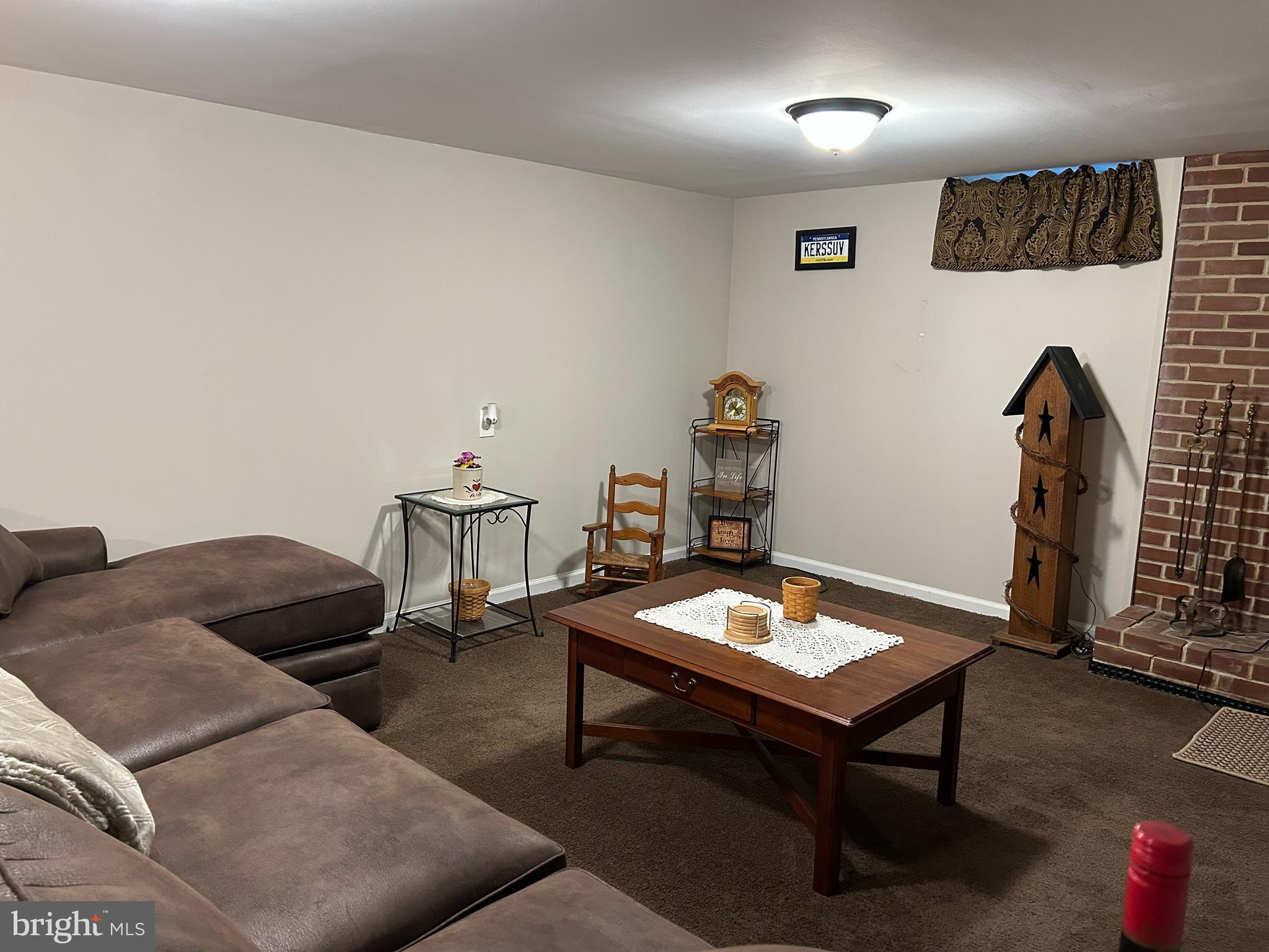 259 Hoffman Road Gettysburg, PA 17325 - Photo 22 of 23 a living room with furniture and a table