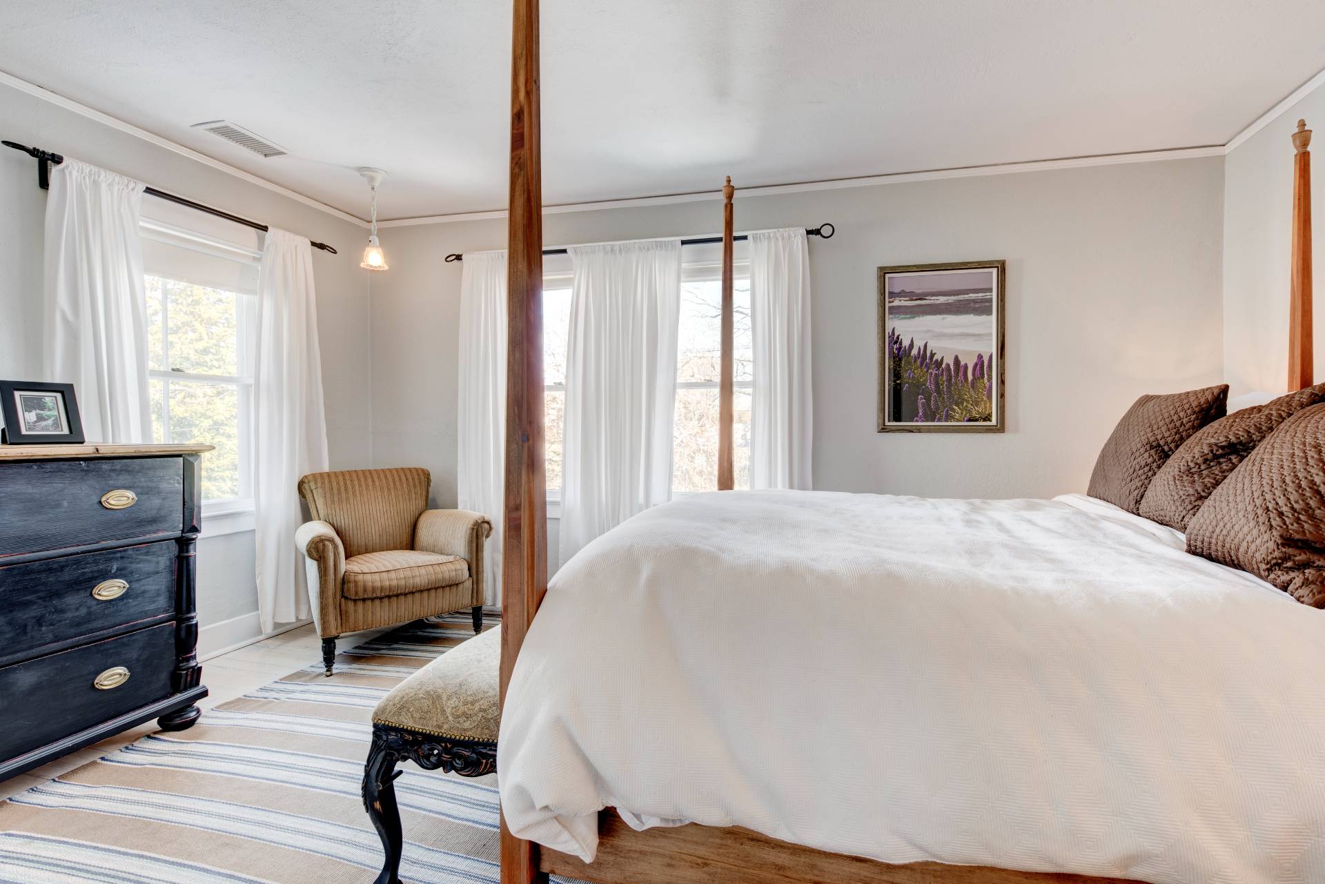 151 Church Lane Bridgehampton, NY 11932 - Photo 12 of 20 a bedroom with a bed and a couch