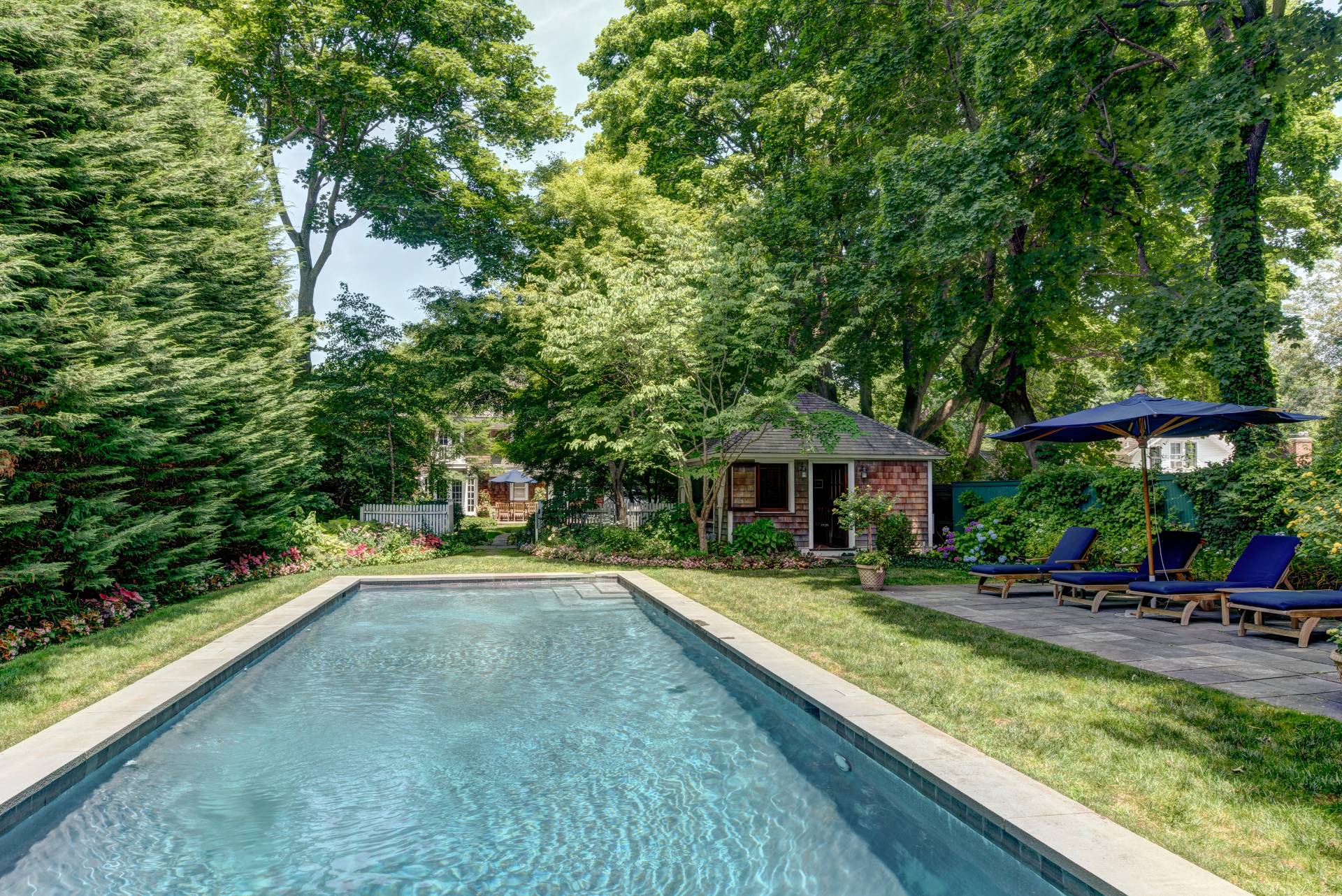 151 Church Lane Bridgehampton, NY 11932 - Photo 20 of 20 a front view of a house with garden