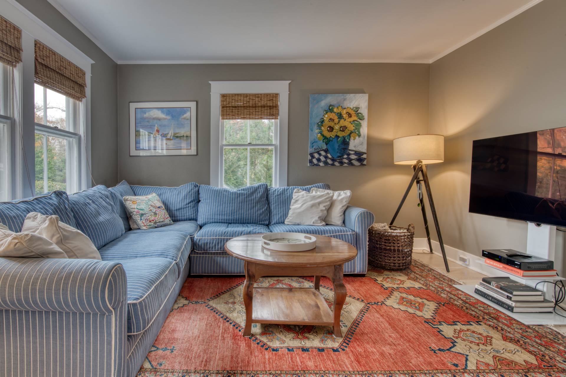 151 Church Lane Bridgehampton, NY 11932 - Photo 6 of 20 a living room with furniture a flat screen tv and a window