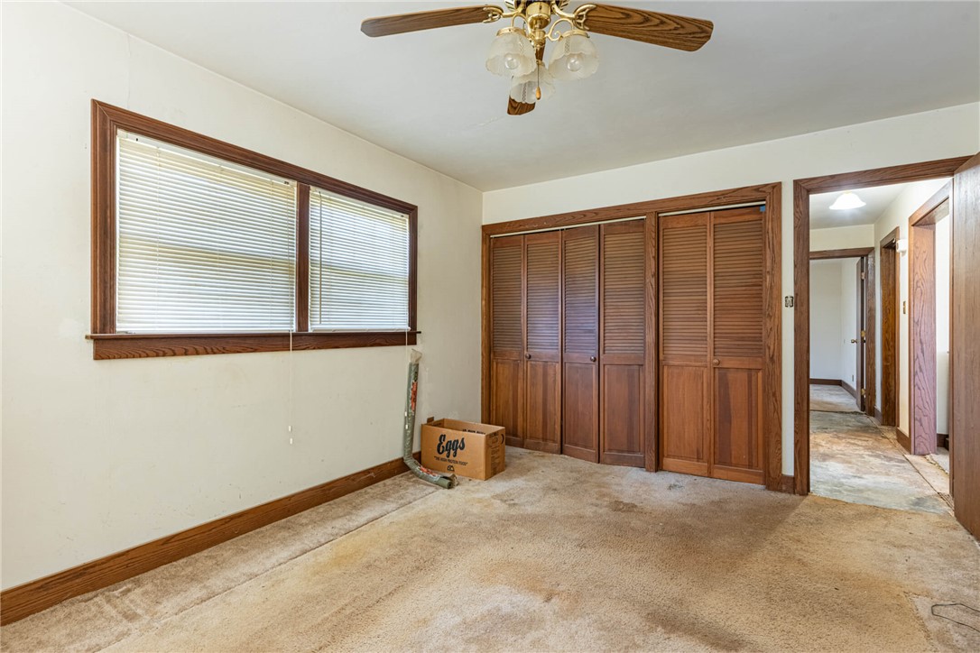 6885 Garber Road Clayton, OH 45415 - Photo 10 of 24 This spacious bedroom offers ample natural light and convenient closet storage.
