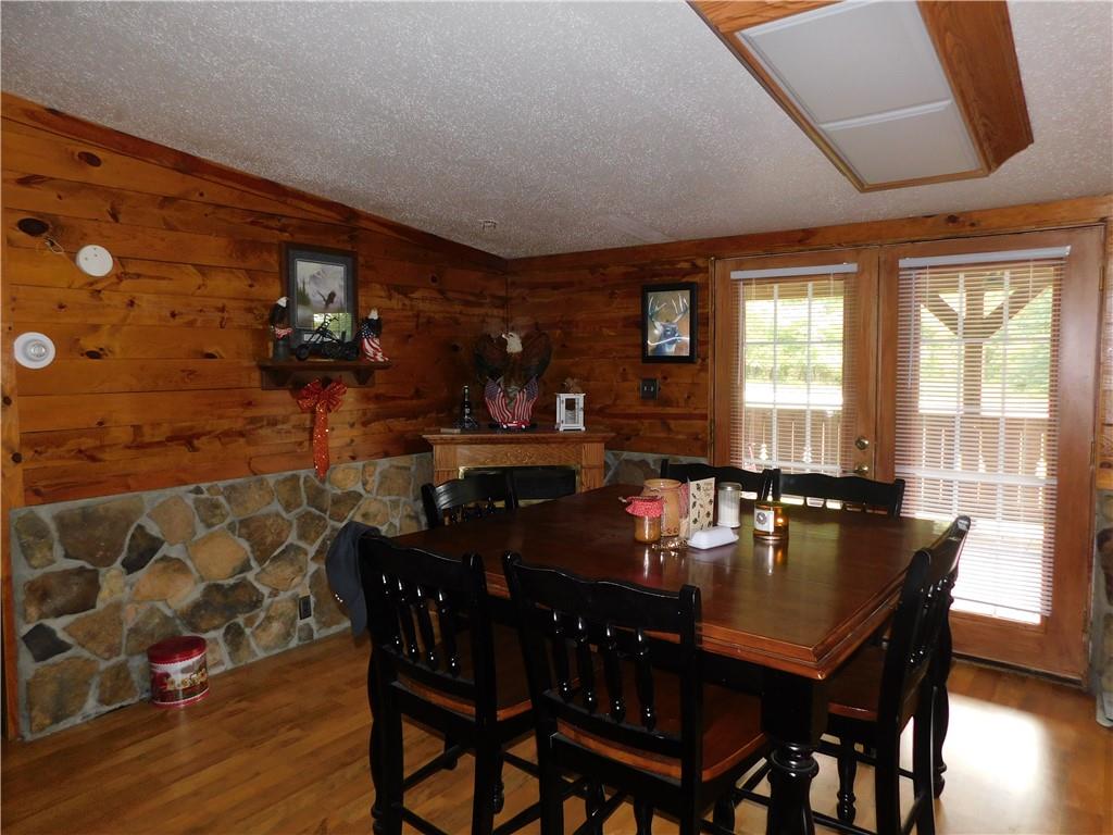 1199 Banning Road Dawson, PA 15428 - Photo 12 of 24 a dining room with furniture and wooden floor