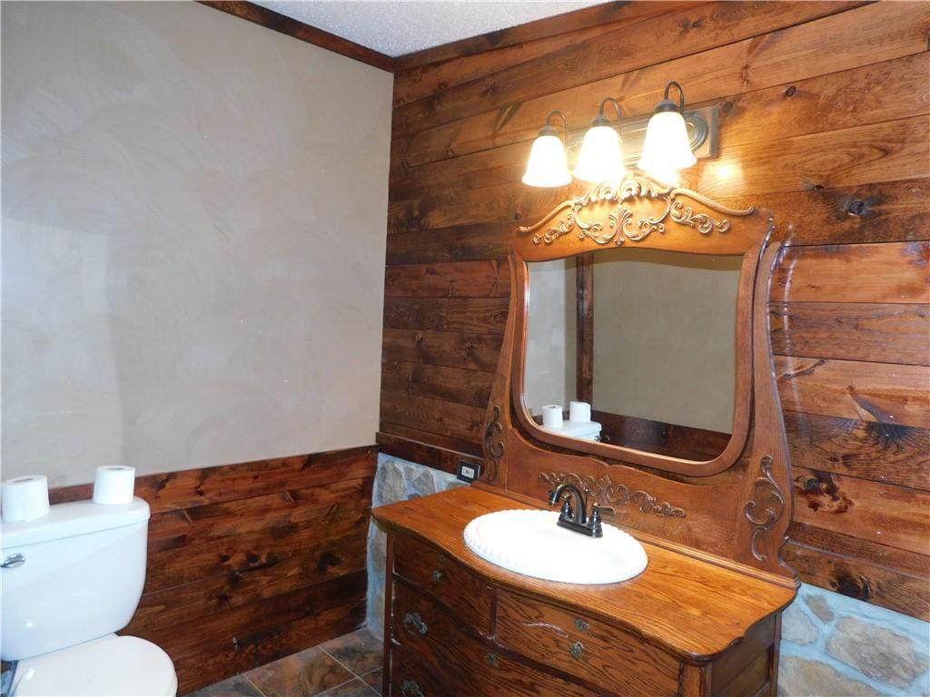 1199 Banning Road Dawson, PA 15428 - Photo 16 of 24 a bathroom with a sink and a mirror